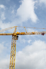 Construction crane set against sky 