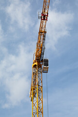 Fototapeta na wymiar Construction crane set against sky 