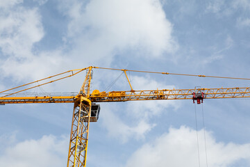Construction crane set against sky 