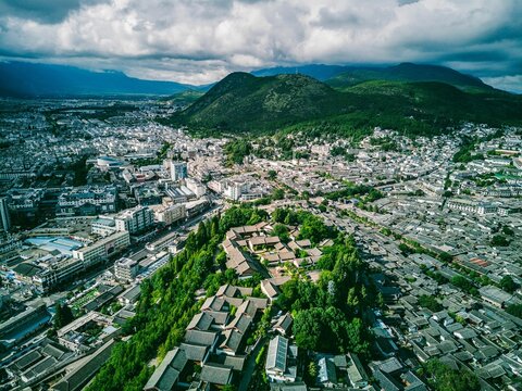 Aerial view of traditional residential buildings in Dayan Ancient Town, Lijiang, Yunnan, China, Asia