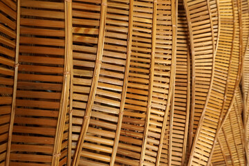 abstract curve pattern that twists and turns smoothly and flows like water waves Made from woven bamboo For building decoration in a modern tropical contemporary style or for making furniture.