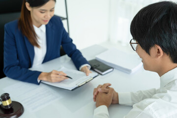 Attoney or lawyer viewing documents.