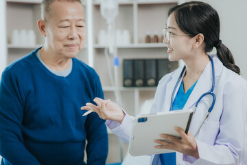 Female doctor talking taking care of her senior patient give support Doctor helping elderly patient with Alzheimer's disease A female attendant holds the hand of an elderly man