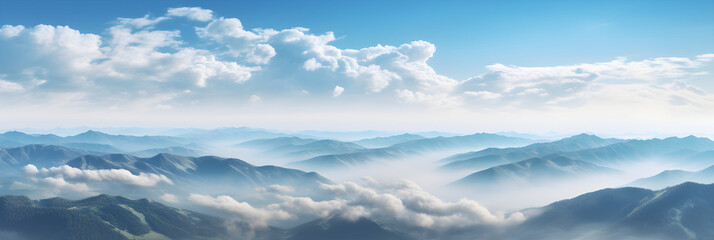 Fototapeta premium Aerial view of beautiful mountains covered with fluffy clouds on sunny day.