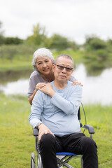 Senior couple taking care of each other in the park