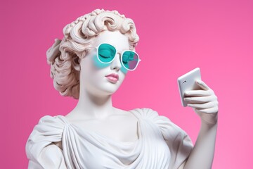 Portrait sculpture of Aphrodite in blue glasses with her eyes closed with a smartphone in her hand taking selfies.