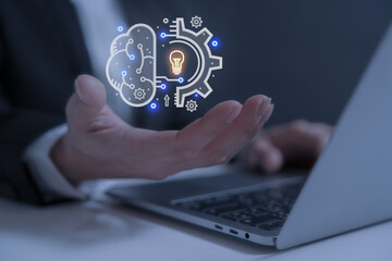 person using Ai technology in his business by artificial intelligence,  smart robot AI, Futuristic technology transformation, using AI technology for making money and running business 