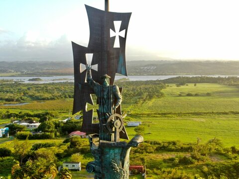 Scenic image of the Statue of Columbus, surrounded by lush green vegetation in Arecibo, Puerto Rico