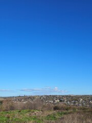 A field with a blue sky