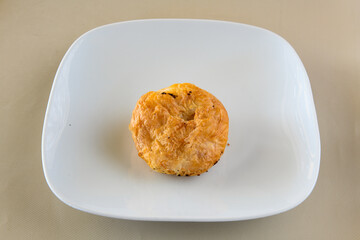 Turkish style meat stuffed filo dough borek served kol boregi. Cheese and minced pie are sliced on a marble background. Turkish name: Kol Boregi, ispanakli, kiymali, Su Boregi