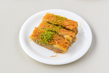Turkish Dessert Sobiyet  Baklava, kadayif,  mussels baklava and classic baklava with Pistachio . Cevizli, Fistikli Baklava, top view.