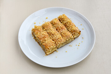 Turkish Dessert Sobiyet  Baklava, kadayif,  mussels baklava and classic baklava with Pistachio . Cevizli, Fistikli Baklava, top view.