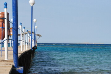 Sea pier. Amazing Red sea with aquamarine color. No filters. - obrazy, fototapety, plakaty