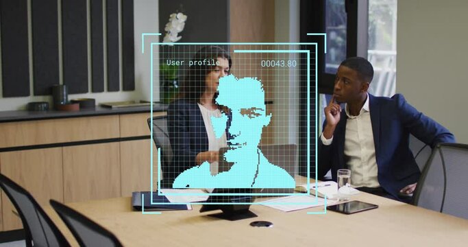 Animation of digital profile picture over diverse coworkers discussing reports on laptop in office