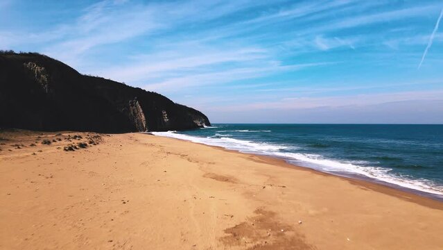 Wavy sand beach in Agva Sile Istanbul TURKEY winter partly cloudy sunny weather aerial low height footage