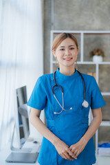 Asian female doctors visit patients for diagnosis and examination at home or in private hospitals....