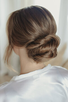 bridal bun hairstyle of brunette bride at the getting ready