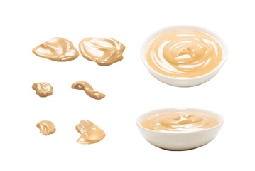Mushroom sauce in a bowl isolated on white background.