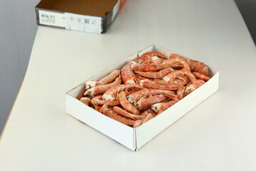 frosted king prawns closeup photo on white table background © ulianna19970