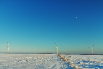 winter snowy fields in Poland, Europe on sunny day in winter, blue sky