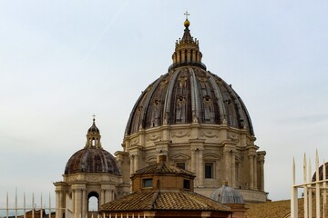 Fototapeta na wymiar Saint Peter's Basilica Dome in Vatican City, Italy
