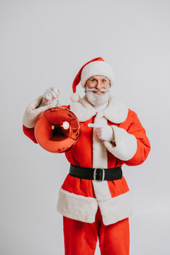 Funny Santa Claus with white beard - Santa Claus portrait with festive costume, Christmas and new year festive days concepts