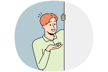 Smiling young man look behind mockup white poster show good deal or offer. Happy male recommend promotion on empty placard. Copy space. Vector illustration.