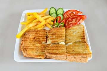 Turkish karisik atom  tost ( kasarli bazlama tost) . Sucuklu, Kasarli, kavurmali karisik tost. Flat baked bread toasted