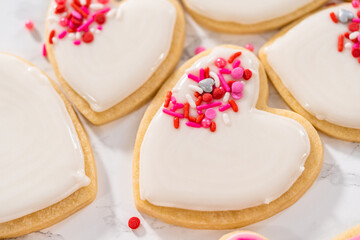 Fototapeta na wymiar Heart-shaped sugar cookies with royal icing