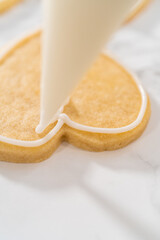 Heart-shaped sugar cookies with royal icing