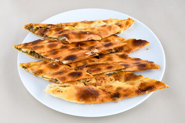 Kiymali pide.Turkish pide with minced meat. Turkish pizza mince pita Pide on white background. Etli ekmek. Kusbasi kasarli, kiymali kasarli, kiymali yumurtali,  tirnak Trabzon, Bafra, Kusbasili pide.