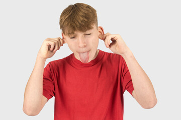 Headshot of a goofy teenage boy