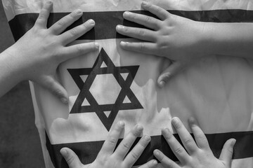 Touching Image. Children's Hands On Israeli Flag with Magen David Symbol - Love Israel, Support, Unity, Patriotism, Heritage, Jewish Identity.
