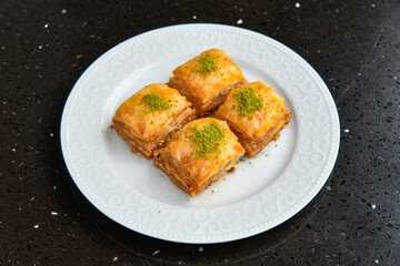 Turkish Dessert Sobiyet  Baklava, mussels baklava and classic baklava with Pistachio . Cevizli, Fistikli Baklava, top view.