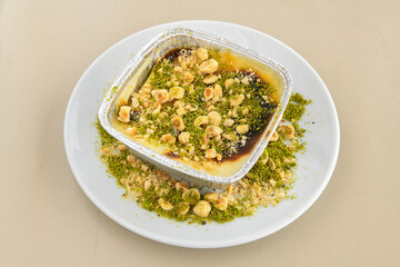 Turkish Dessert Sobiyet  Baklava, mussels baklava and classic baklava with Pistachio . Cevizli, Fistikli Baklava, top view.