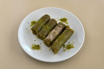 Turkish Dessert Sobiyet  Baklava, mussels baklava and classic baklava with Pistachio . Cevizli, Fistikli Baklava, top view.