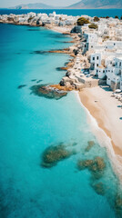 drone photo, aerial view, of a Mediterranean Greek town by the ocean, vertical orientation 