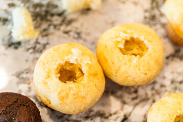 Filling Vanilla, Chocolate Cupcakes with Lemon, Raspberry