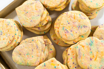 Packing Sprinkle-Adorned Sugar Cookies into Boxes