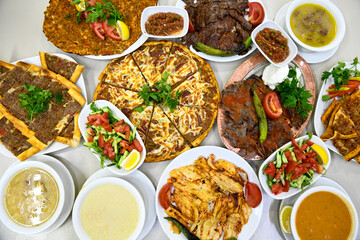 Table scene of assorted take out or delivery foods. Traditional Turkish cuisine. Various Turkish meal and appetizers. Top down view on a table.