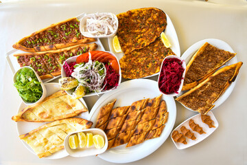 Kiymali pide.Turkish pide with minced meat. Turkish pizza mince pita Pide on white background. Etli ekmek. Kusbasi kasarli, kiymali kasarli, kiymali yumurtali,  tirnak Trabzon, Bafra, Kusbasili pide.