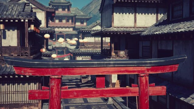 A vibrant red gate standing before a picturesque row of traditional Japanese buildings
