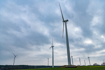 windmill view. wind turbine generator for electricity. Green energy. generate electricity. windmill turbines generating green energy. Windmills for power production. Windmill farm. wind turbines