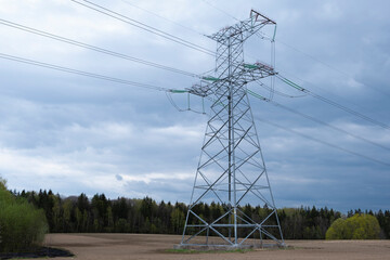 Electric power masts and cables, pylons. Electricity power station. 