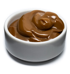 Dulce de leche in a small bowl on isolated background.