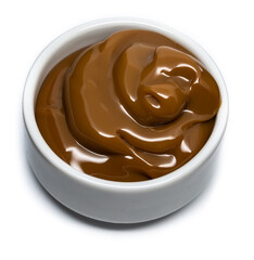 Dulce de leche in a small bowl on isolated background.