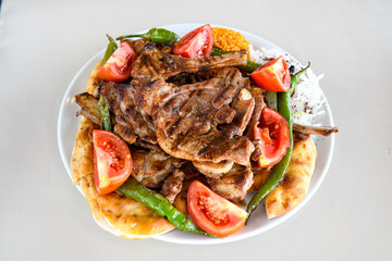 Chicken wings barbeque in a dish with BBQ grill sauce . Izgara tavuk kelebek sis kanat. Tavuk sis, gogus.