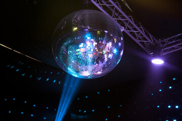 Shiny crystals disco ball with dark night party background horizontal