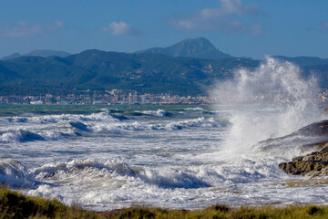 cam Pastilla.Spain-November 5, 2023: storm off the coast of Mallorca at the end of the tourist season, waves crashing on the shore and flying spray