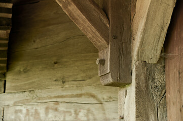 old wooden log of an ancient orthodox ukrainian church, close-up
